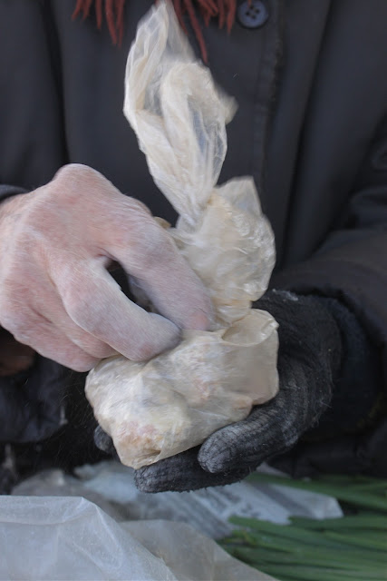 An old lady sells incense/frankincense, by the chunk. Georgia