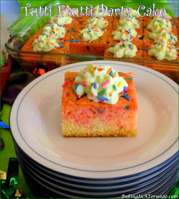 Tutti Frutti Party Cake, a fun colorful cake with hints of lemon, strawberry, orange and key lime, perfect for any occasion. | Recipe developed by www.BakingInATornado.com | #recipe #dessert