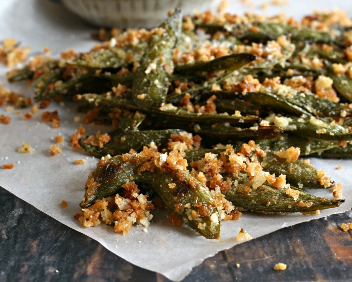 Crispy, oven roasted sugar snap peas with olive oil, cheese and seasoning.