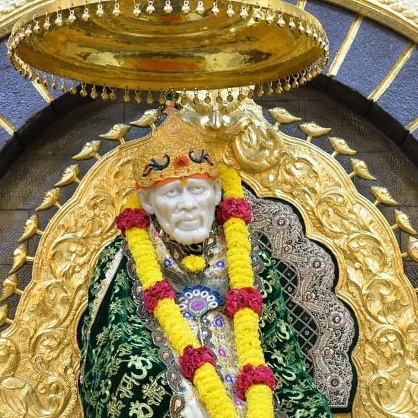 Black Color Clothes wear Sai baba in this images 