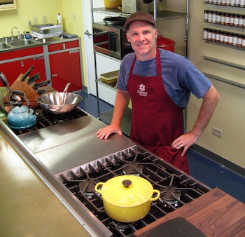 mike johnston in his test kitchen at savory spice shop creating new seasoning blends