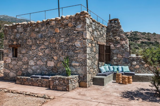 A rustic stone house on the beach in Crete, Greece