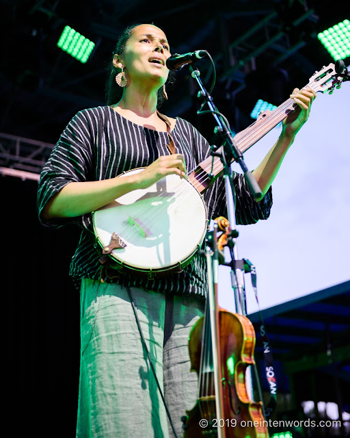 Rhiannon Giddens with Francesco Turrisi at Hillside Festival on Friday, July 12, 2019 Photo by John Ordean at One In Ten Words oneintenwords.com toronto indie alternative live music blog concert photography pictures photos nikon d750 camera yyz photographer