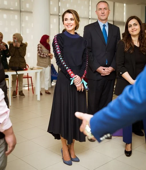 Queen Rania wore Jimmy Choo shoes. Queen Rania wore Maison Makarem Fearful Symmetry long sleeve blouse and skirt