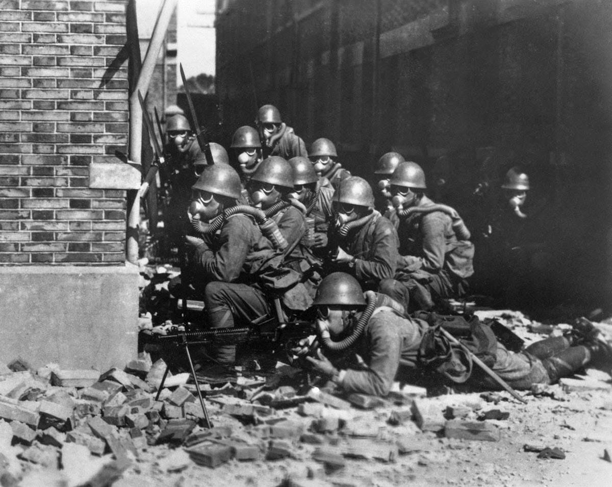 Japanese Special Naval Landing Forces with gas masks and rubber gloves during a chemical attack, Battle of Shanghai, 1937