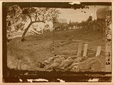 Unfinished Confederate grave near the center of battlefield of Gettysburg, July 1863. M. Brady