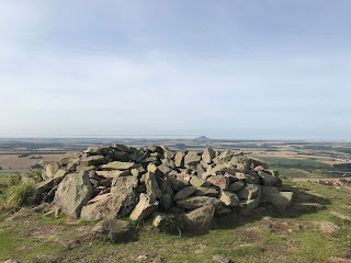 A picture of the stone Cairn at the summit of Traprain Law in East Lothian.  Picture by Kevin Nosferatu for the Skulferatu Project.