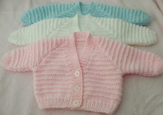 http://www.craftsy.com/pattern/knitting/clothing/baby-cardigan-garter-st-pattern/194370