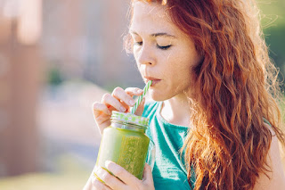 Lady Drinking Green Juice