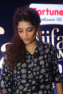 Ritika Singh in Black Printed Shirt and White Leggings at IIFA Utsavam Awards press meet 27th March 2017