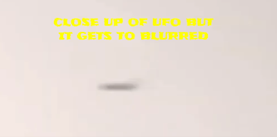 Zooming in on the UFO over houses in Melbourne loses the pixels.