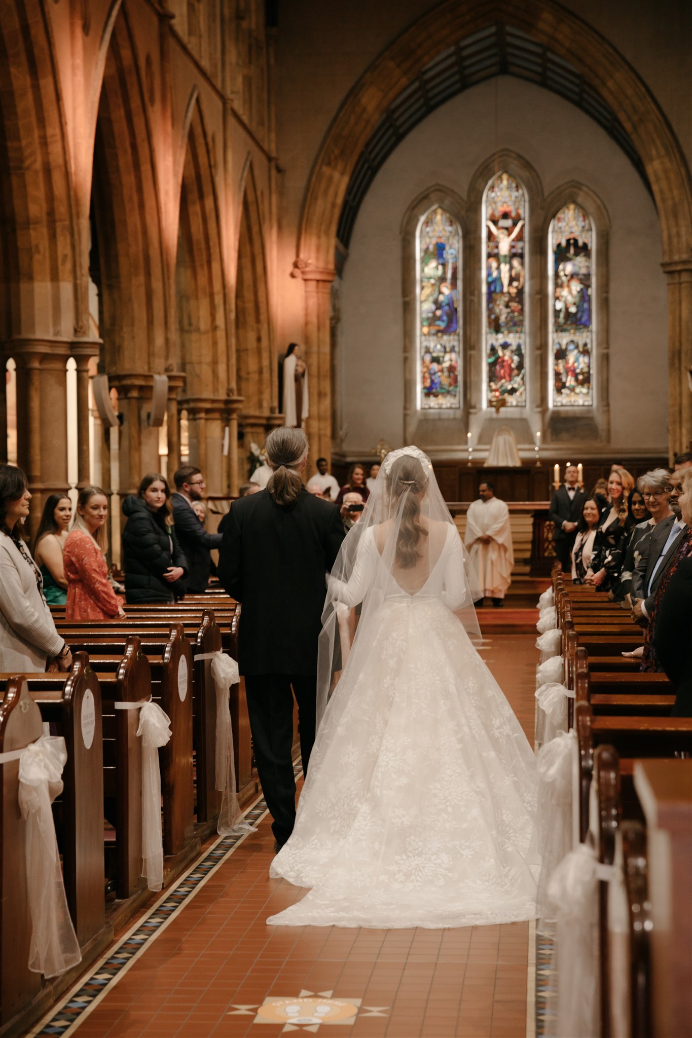 the ivory story wedding photography cathedral adelaide florals bridal gown love