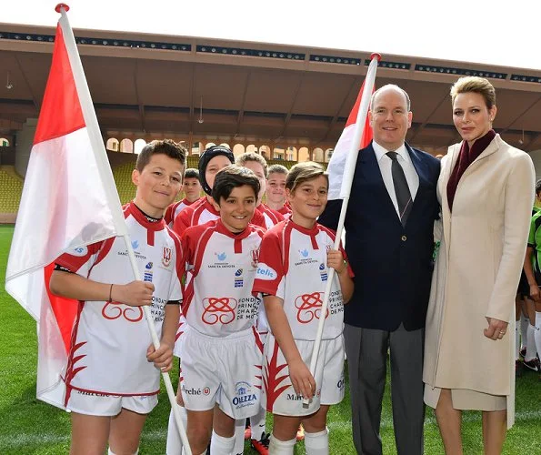 Princess Charlene, Princess Gabriela and Prince Albert II of Monaco attend the 7th Sainte Devote Rugby Tournament at the Louis II Stadium