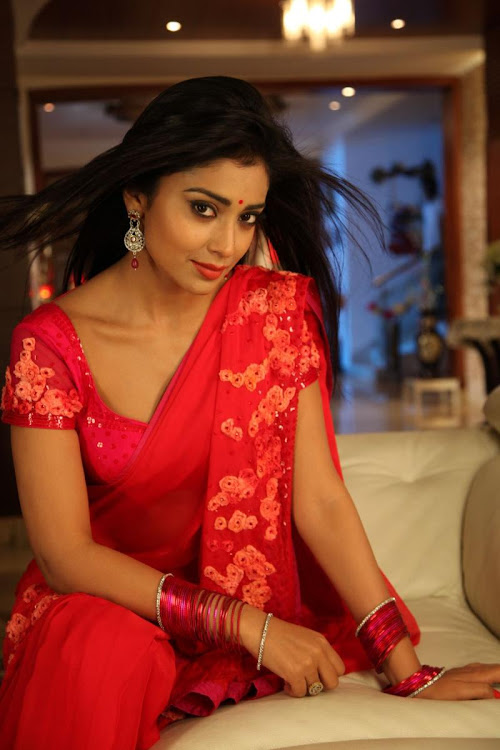 Shriya Saran in red hot Saree Stills for Pavithra Movie
