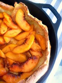 A showstopper presentation is made when you serve this deliciously light and fluffy Dutch Baby filled with juicy ripe peaches at your next breakfast or brunch! - Slice of Southern