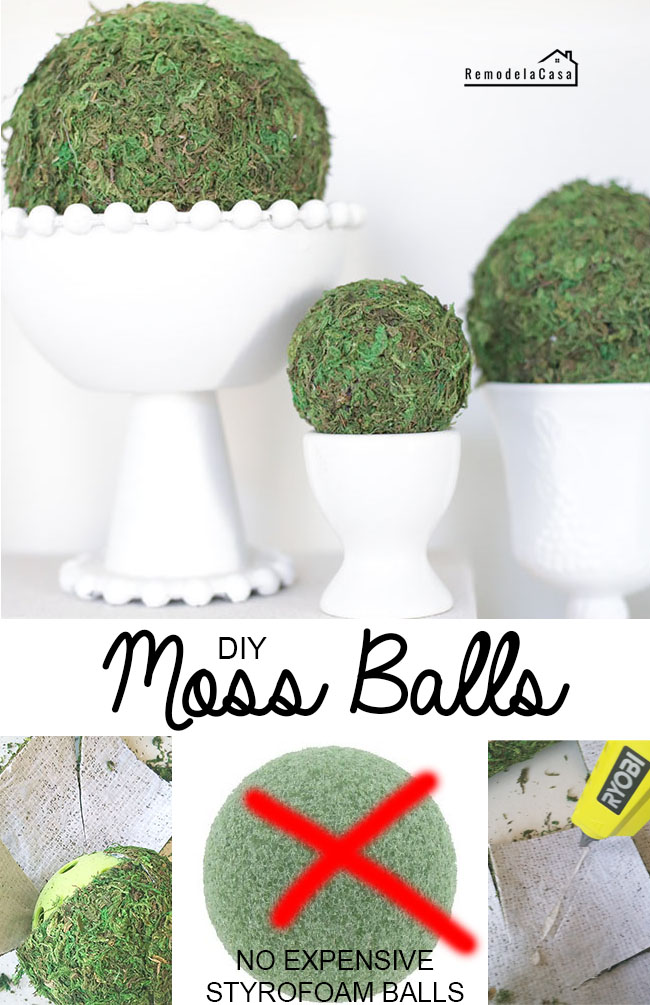 moss balls a top white vases on a shelf