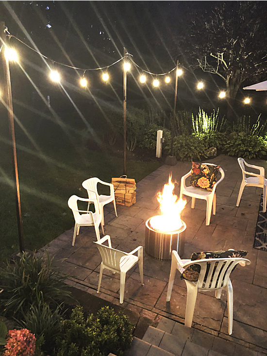 DIY Outdoor string lights on the patio backyard at night with lights