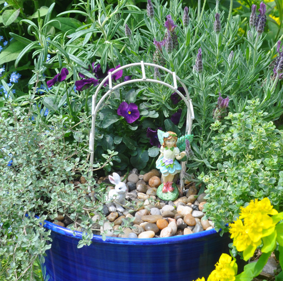 Three Dogs in a Garden Creating An Ornamental Herb Garden
