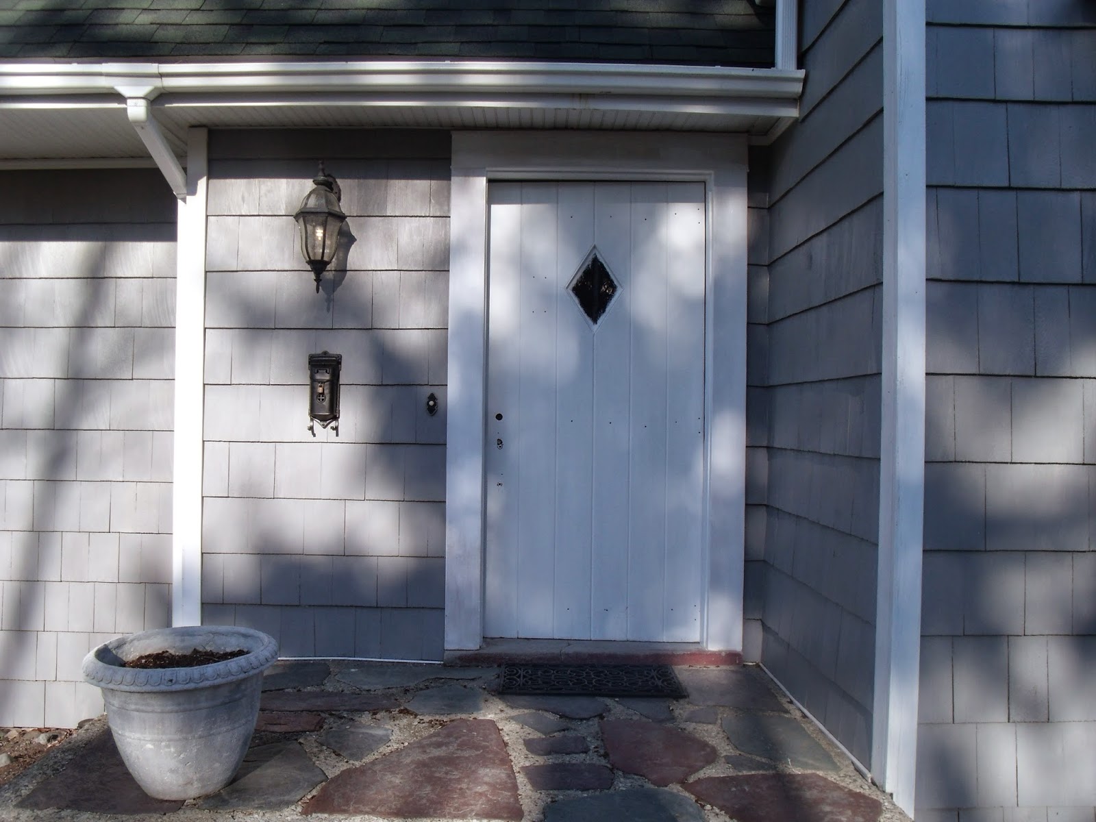 Gear Acres at Top of the Hill First Top Coat on the Front Door