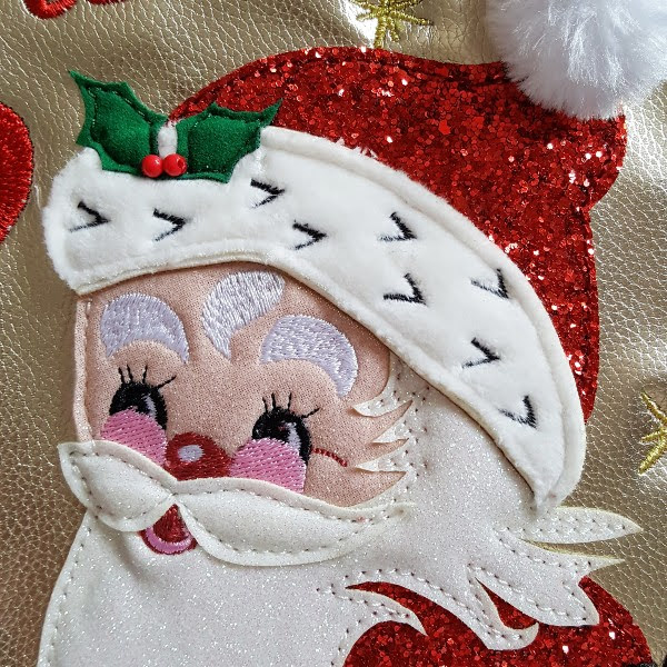 Santa applique face close up on clutch bag