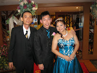 Jason Geh, the band manager flanked by newly weds Alvin and Casper