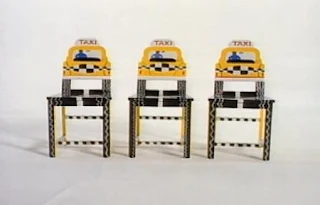 Three taxi chairs appear in an animation. Sesame Street The Great Numbers Game