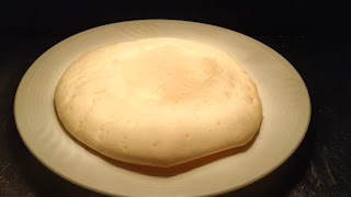 Baked pizza base for Margherita pizza Recipe