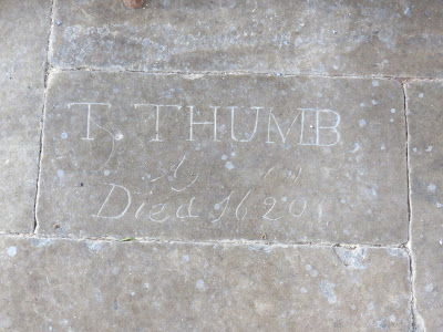 Stone with carved inscription reading 'T.Thumb Aged 101, Died 1620'
