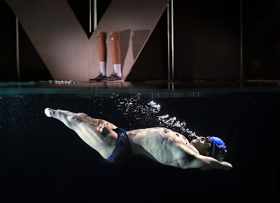 Alex Coppel’s image of Paralympian Ahmed Kelly underwater and in motion, his prosthetics on the sideline