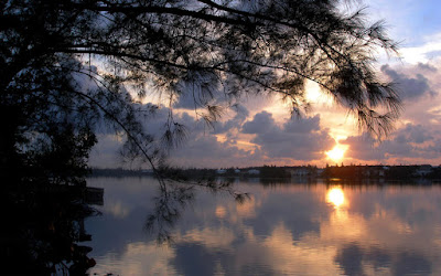 Sunrise over reflective lake