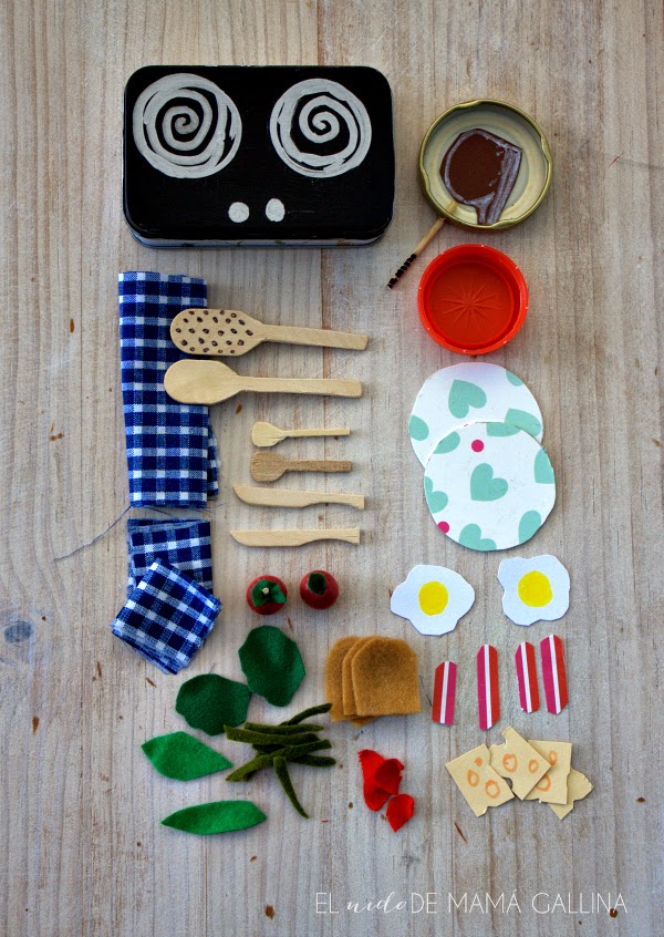 DIY mini toy kitchen including stove, napkins, vegetables, fruits, utensils and plates