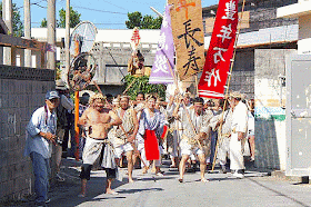 gif, men, parade, riyual,drums, flags, barefoot