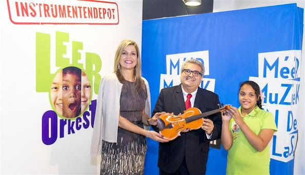 Queen Maxima of The Netherlands visited a workshop where music instruments are being refurbished and prepared in Amsterdam 