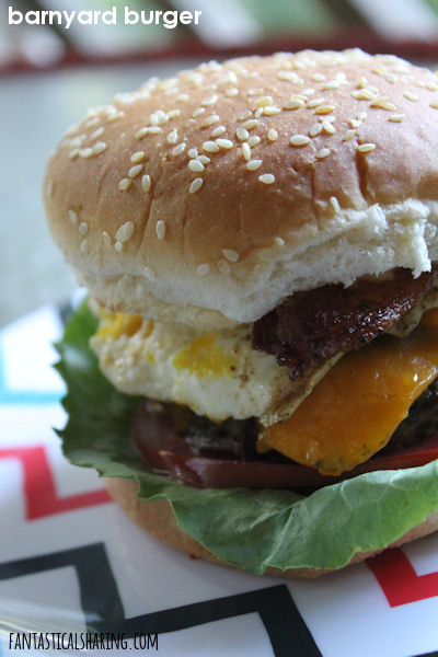 Barnyard Burgers // There's a little bit of everything from the barn on this burger! #recipe #burger #egg #beef #bacon