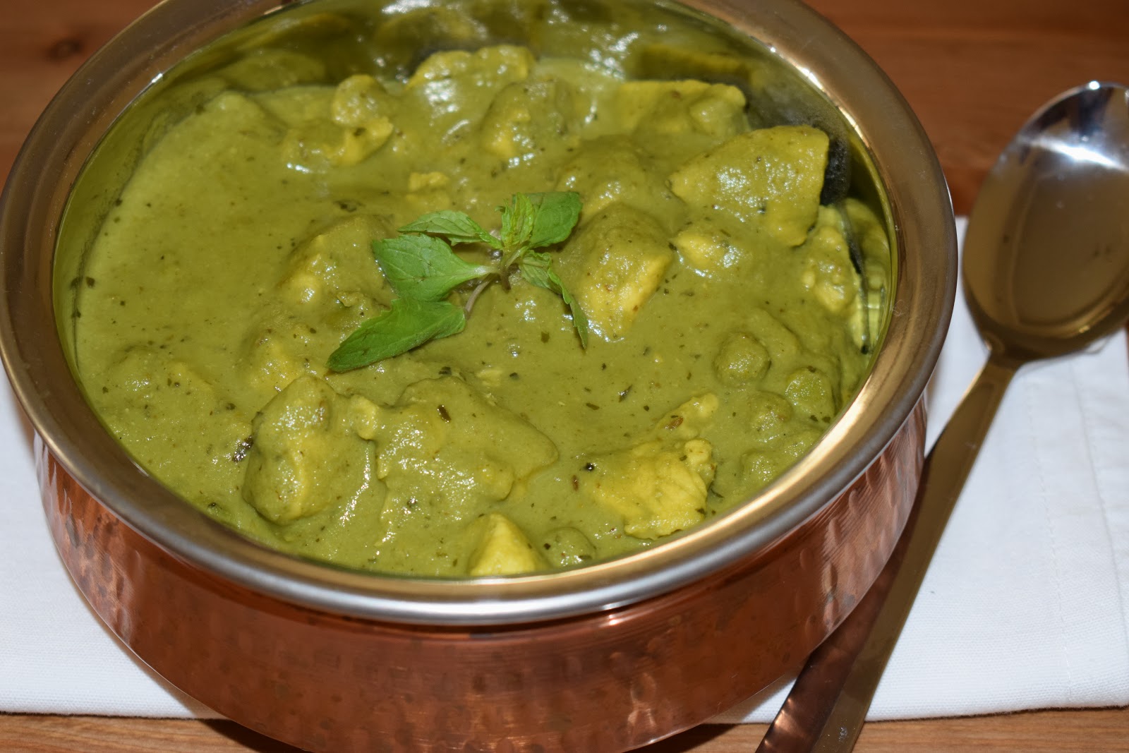 Chicken with green peas in thick green gravy My Indian Bistro