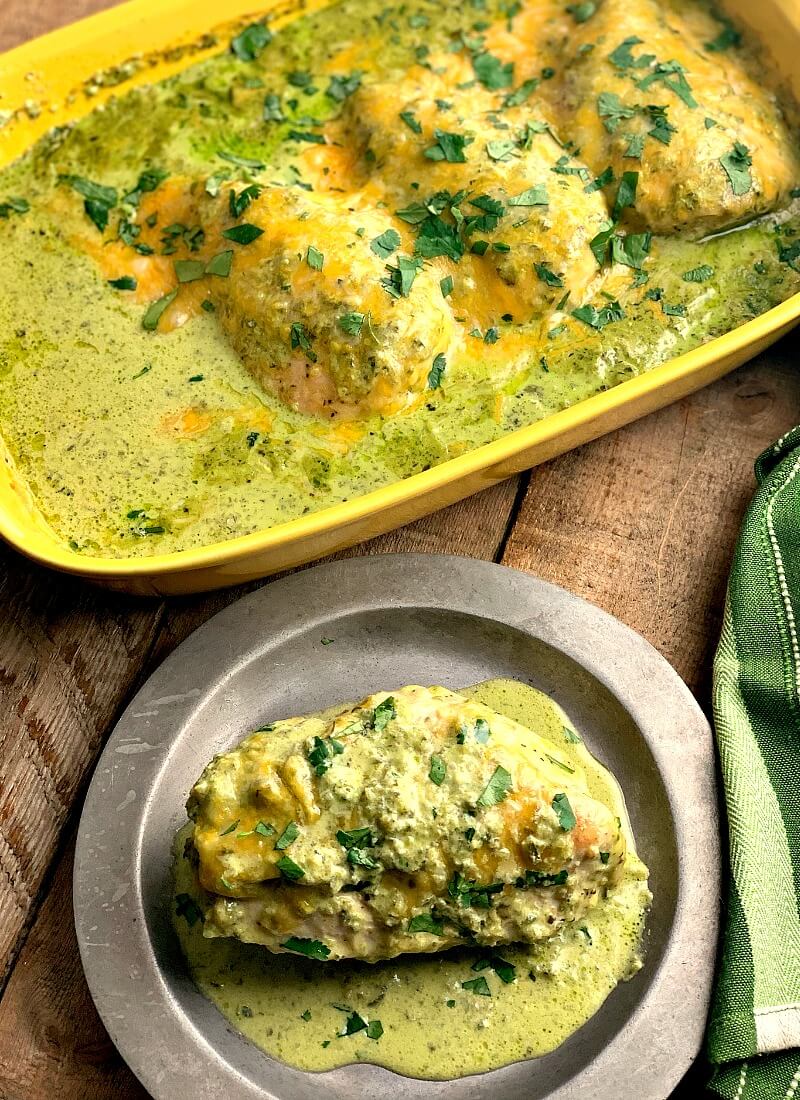Baked Green Chile Chicken - This Baked Green Chili Chicken recipe is an easy and delicious low carb and keto-friendly dinner filled with spice, cheese, and a creamy green chili sauce. #Mexican #chicken #lowcarb #keto #glutenfree #chickenbreast #chickenthighs | bobbiskozykitchen.com