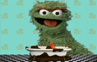 Oscar the Grouch states that Slimey took a mud bath. Sesame Street Elmo's World Bath Time Quiz