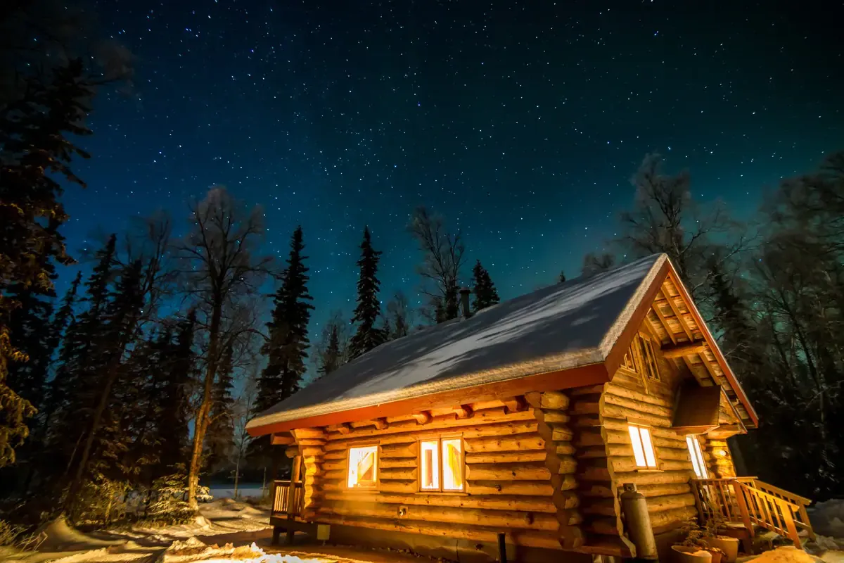 nana's-cozy-log-cabin-is-available-for-rent-on-airbnb-during-winters-night