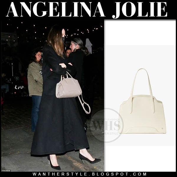 Angelina Jolie in white tee, black jeans with white shoulder bag on August  28 ~ I want her style - What celebrities wore and where to buy it. Celebrity  Style