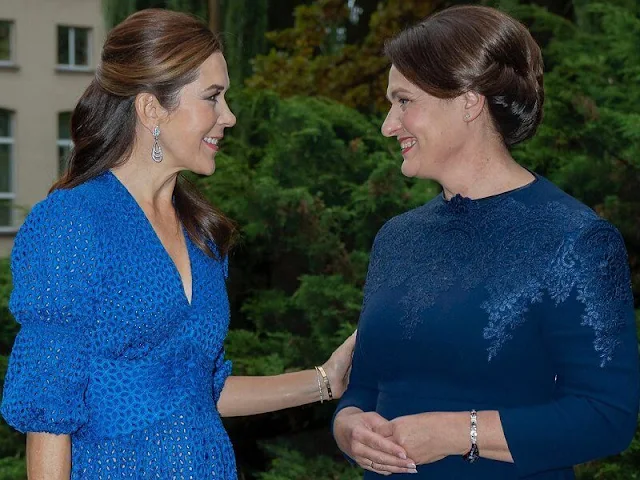 Crown Princess Mary wore a willow cobalt dress by Cult Gaia. Prada blue satin clutch. Diana Nausėdienė