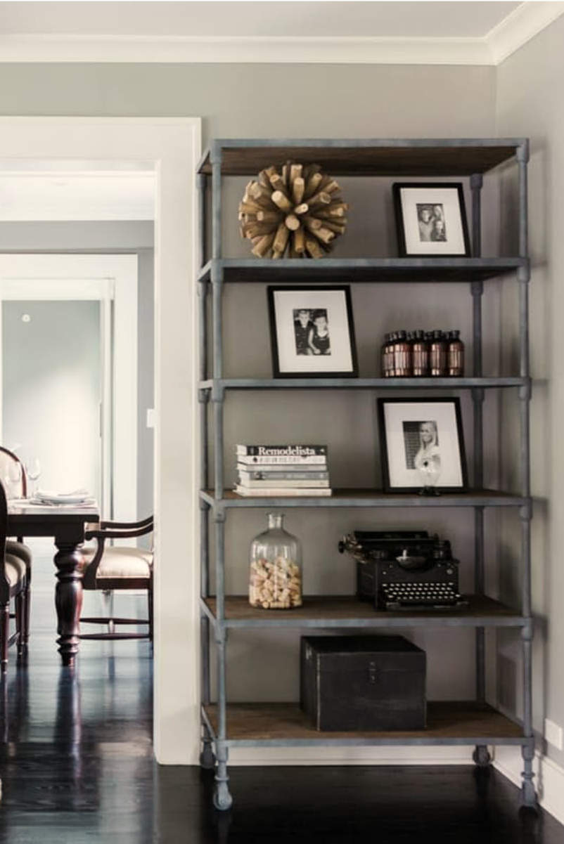 Industrial shelving in a modern farmhouse living room on Hello Lovely Studio