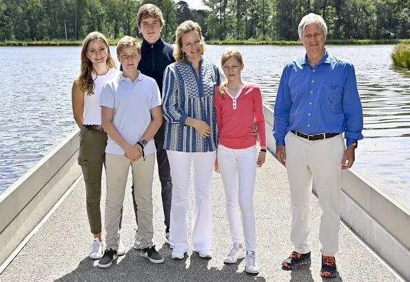 Queen Mathilde, Crown Princess Elisabeth, Prince Gabriel, Princess Eleonore and Prince Emmanuel. Etro blue embroidered blouse, Zara top