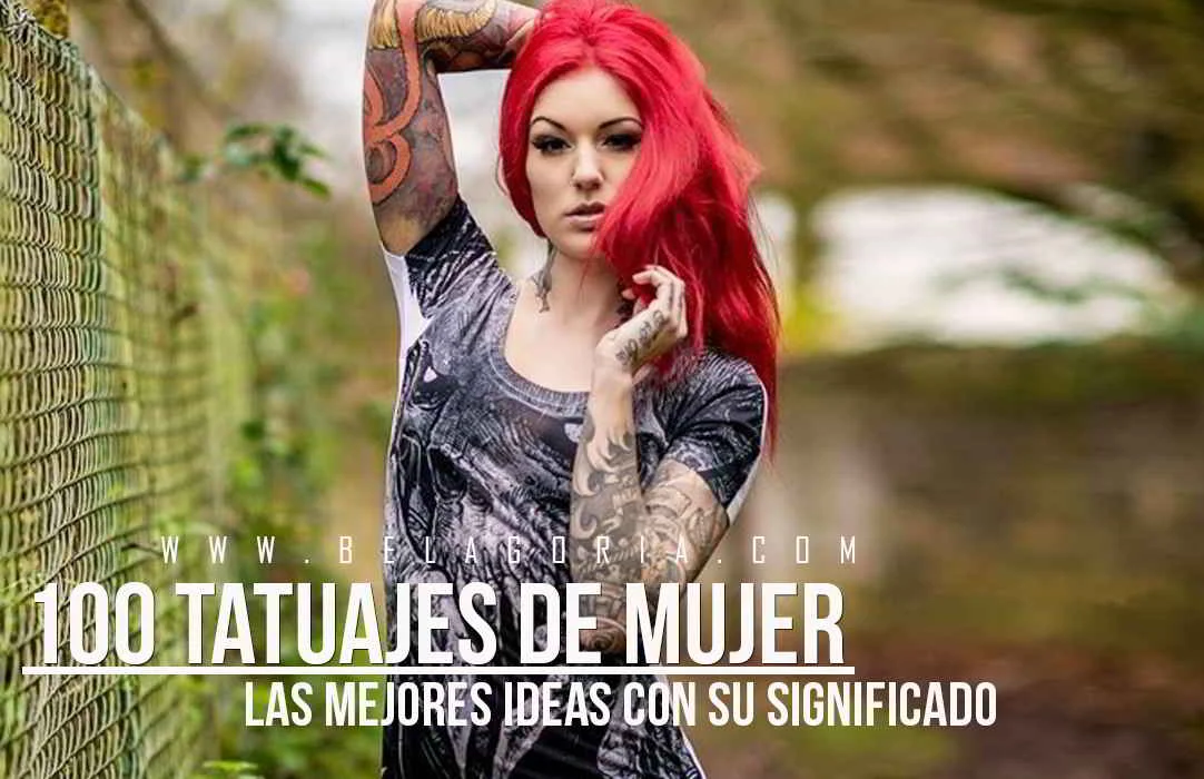 Foto de mujer peliroja posando en un parque, lleva tatuajes femeninos y muy vistosos