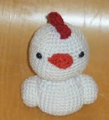 http://www.ravelry.com/patterns/library/a-very-chickie-crochet-pattern