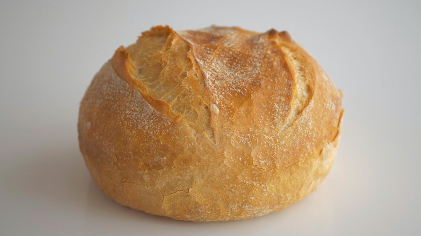 Хлеб без замеса рецепт. Хлеб без замеса. Хлеб без замеса в духовке. Пшеничный хлеб. Греческий хлеб без замеса в духовке.