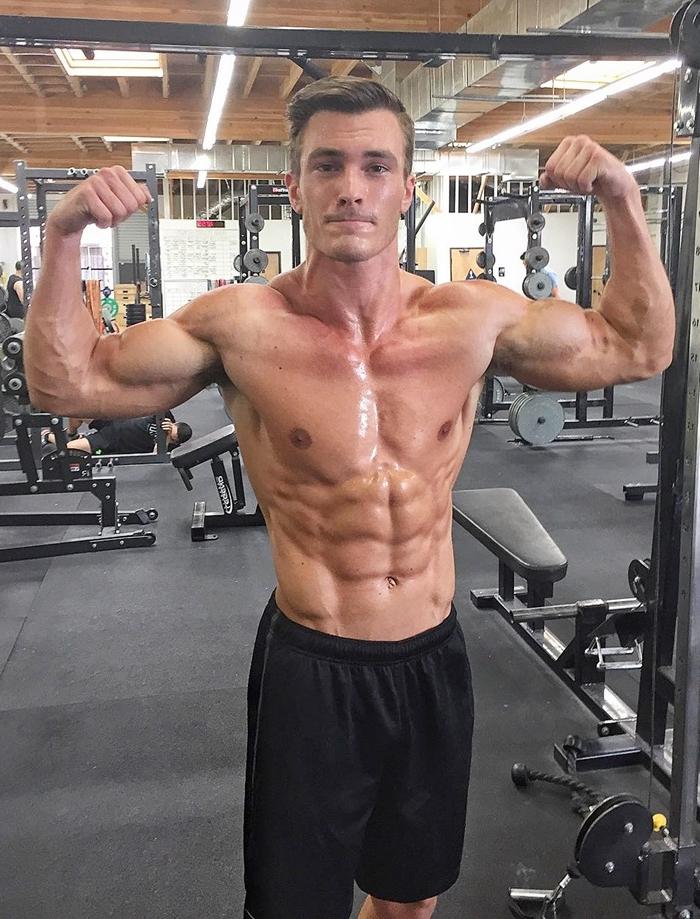 strong-ripped-muscular-man-shirtless-sweaty-gym-hunk-flexing-biceps-abs