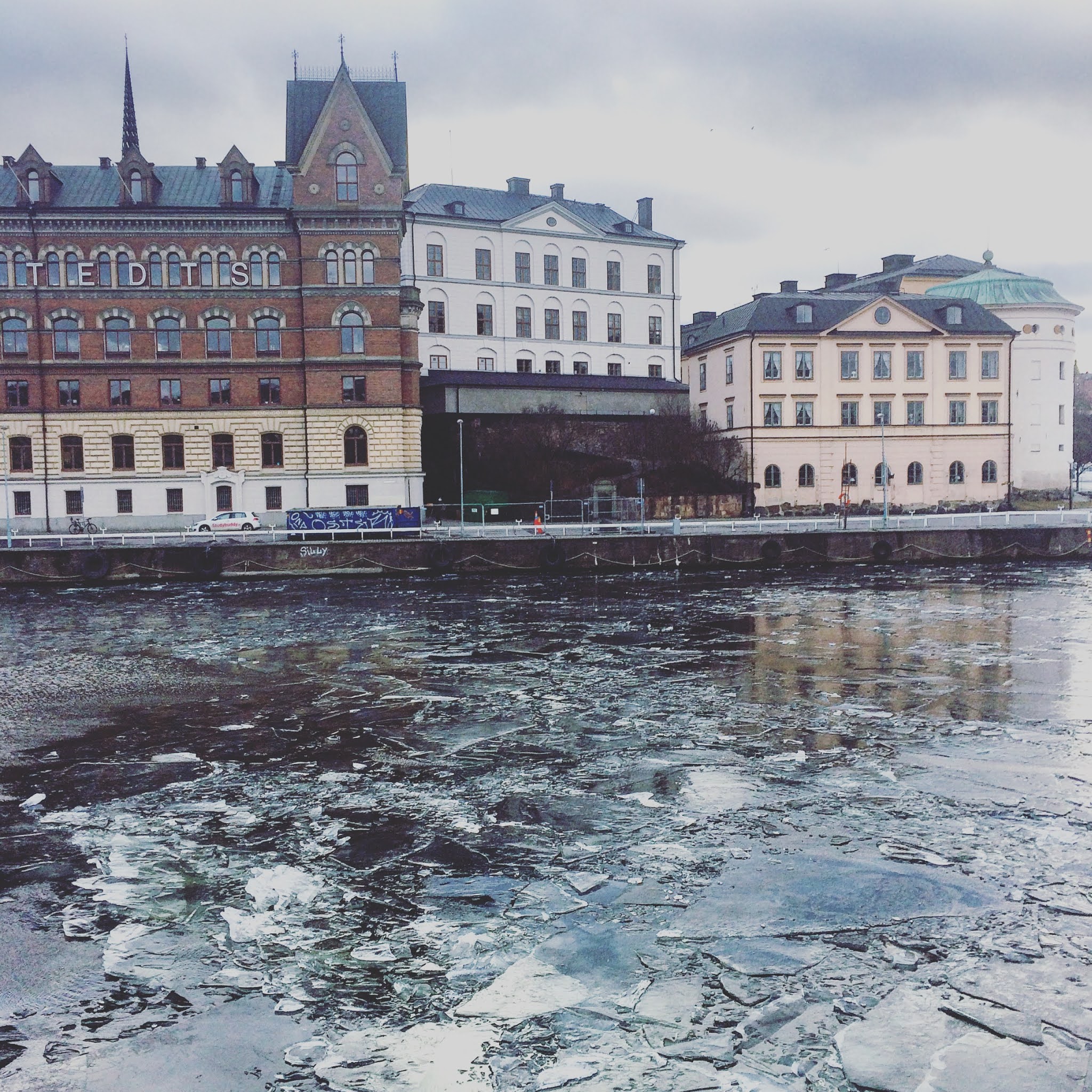 icy river running through stockholm city centre