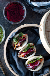 steamed beef cheeks braised banh mi pickled arrange bun veggies sriracha drizzle serve split
