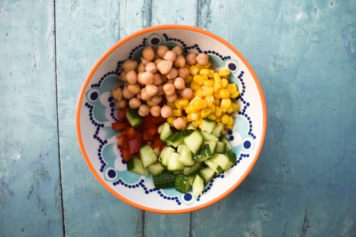 Vegan macaroni salad -Step 3 (chickpeas and cucumber added to bowl)
