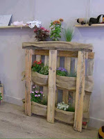 Pallets de madera reutilizados para colocar plantas Pallets de madera reutilizados para colocar plantas
